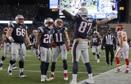 Rob Gronkowski celebrated with teammates after scoring a touchdown in the third quarter.
